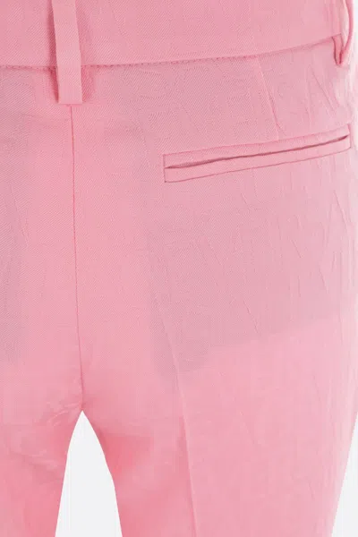 Versace Pink Flare Pants With Tonal Logo Lettering In Wool Woman In Pink