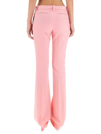 Versace Pink Flare Pants With Tonal Logo Lettering In Wool Woman In Pink