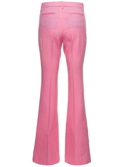 Versace Pink Flare Pants With Tonal Logo Lettering In Wool Woman In Pink