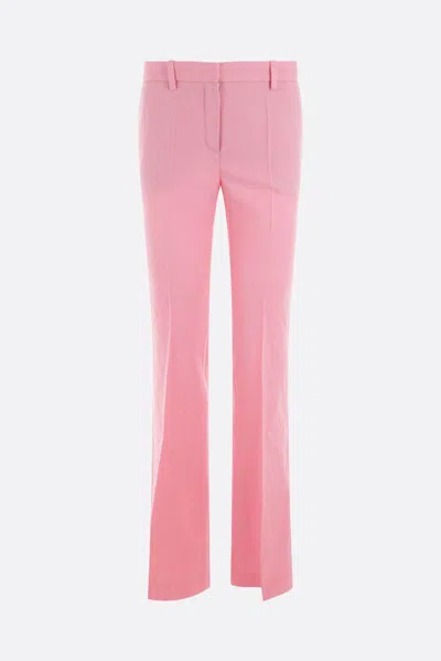 Versace Pink Flare Pants With Tonal Logo Lettering In Wool Woman In Pink