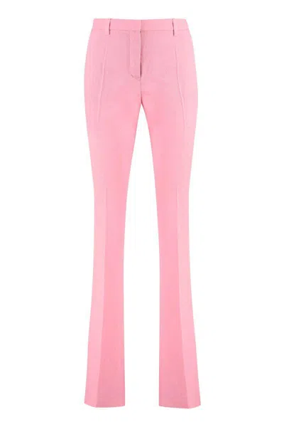 Versace Pink Flare Pants With Tonal Logo Lettering In Wool Woman In Pink