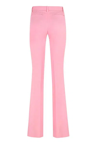 Versace Pink Flare Pants With Tonal Logo Lettering In Wool Woman In Pink