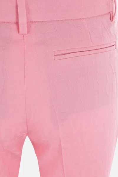 Versace Pink Flare Pants With Tonal Logo Lettering In Wool Woman In Pink