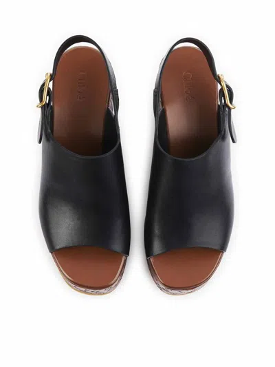 Chloé Maxime Black Wedge With Engraved Written Decorations And Logo Buckle In Leather Woman In Black