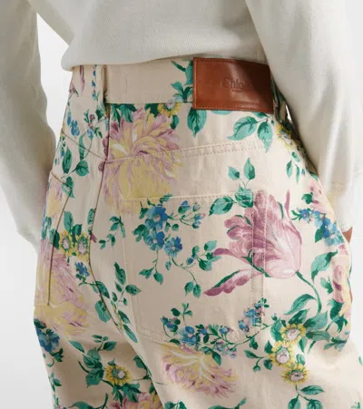 Chloé Women Flare Denim Jeans With All-over Flowers Print In Multi