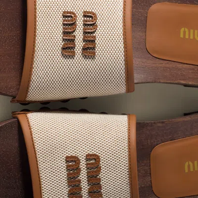 Miu Miu Canvas And Leather Studded Clog Sandals In Neutral