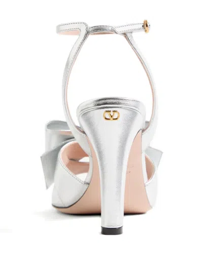 Valentino Garavani Bowow Sandal In Laminated Nappa 95mm Woman Silver 40 In Neutral