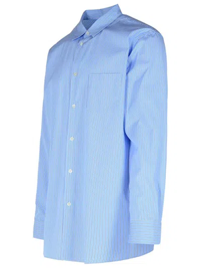 Comme Des Garçons Collared Shirt With Curved Hem And Pocket In Blue