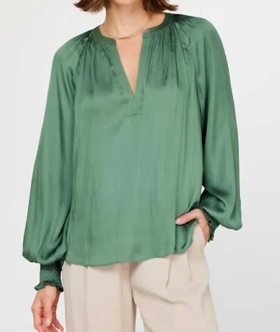 CURRENT AIR LONGSLEEVE SATIN TOP IN SAGE GREEN 