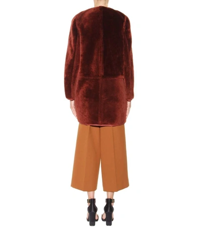 Shop Marni Reversible Fur Coat In Raisie