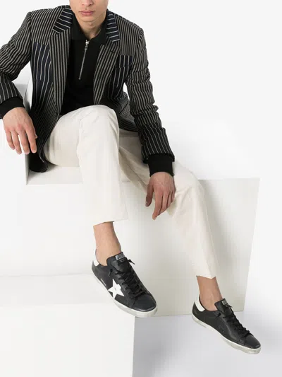 Golden Goose 'super-star' Black Low Top Sneakers With Logo Patch And Suede Details In Leather Man