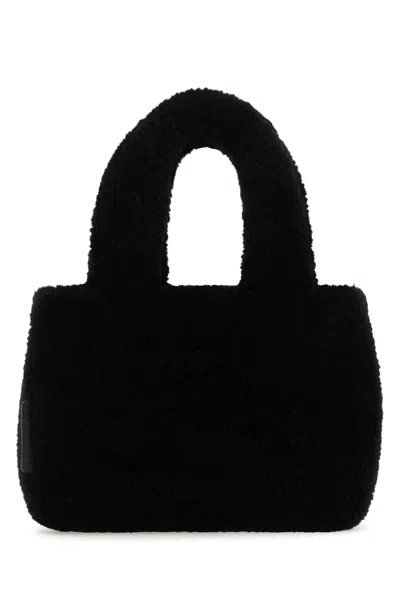 Amina Muaddi Shearling Handbag With Twin Handles And Structured Silhouette