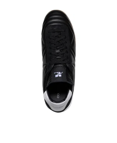 Courrèges Quilted Low Top Sneakers In Black
