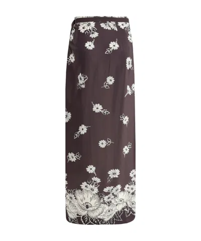 P.a.r.o.s.h White And Black Skirt With Side Closure And All-over Floral Printed Pattern