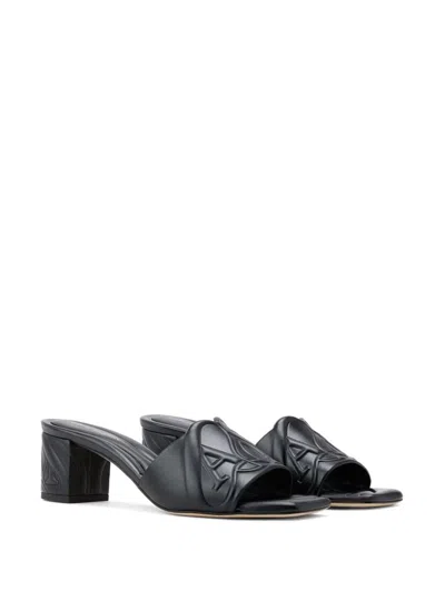 Alexander Mcqueen Black Slip-on Sandals With Embossed Logo In Padded Leather Woman