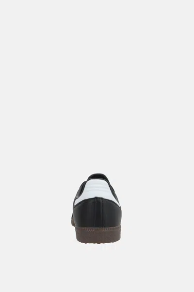 Adidas Originals Low-top Rubber Sole Sneakers With Contrast Stripes In Black