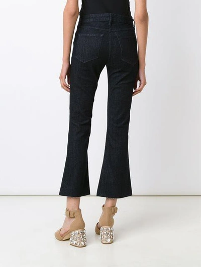 A.w.a.k.e. Cropped Flared Jeans