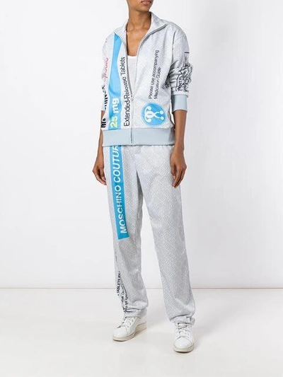 Shop Moschino Pill Packet Track Pants In Grey