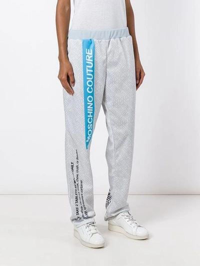 Shop Moschino Pill Packet Track Pants In Grey