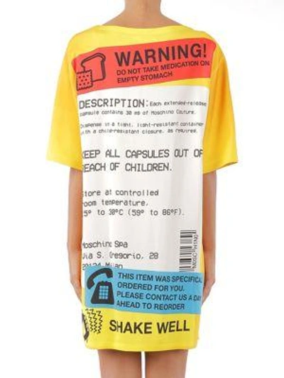 Shop Moschino Short-sleeve Prescription Print T-shirt Dress In Orange Multi