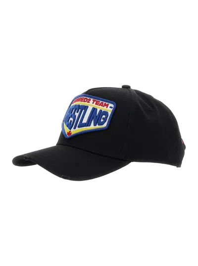DSQUARED2 BLACK BASEBALL CAP WITH MAXI PRINT ON THE FRONT AND LOGO LETTERING ON THE REAR IN COTTON MAN 