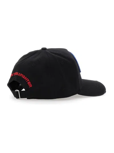 DSQUARED2 BLACK BASEBALL CAP WITH MAXI PRINT ON THE FRONT AND LOGO LETTERING ON THE REAR IN COTTON MAN 