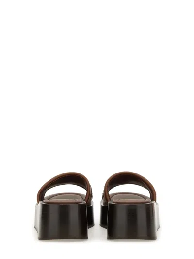 Fendi Women Brown Slides With Wedge Heel And Ff Motiv On The Band In Leather Man
