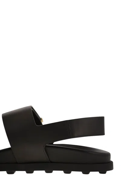 Tod's Black Rubber Sandals With Metallic Accents