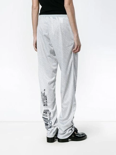 Shop Moschino Pill Packet Track Pants