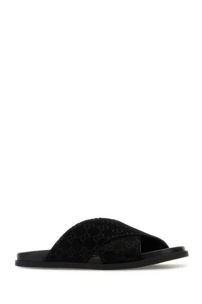 Gucci Men Leather Slides With All-over Gg Motif In Black