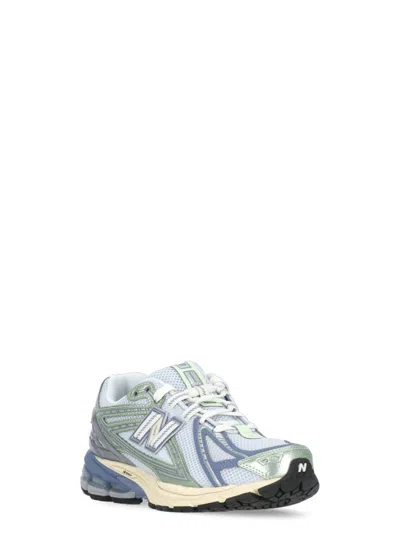 New Balance Blue Low Top Sneaker With Logo Patch On Tongue And Side And Perforated Panels