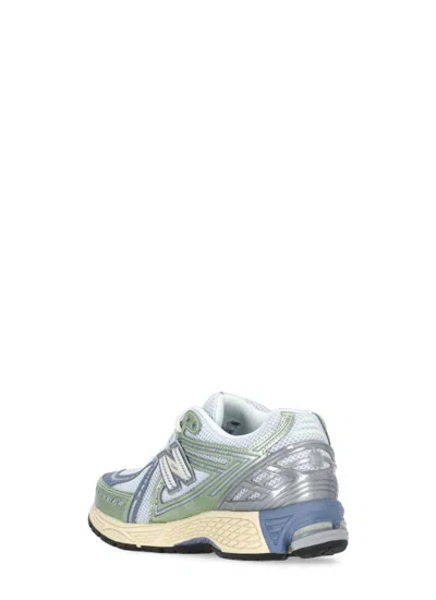 New Balance Blue Low Top Sneaker With Logo Patch On Tongue And Side And Perforated Panels