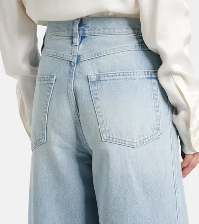 Frame Twisted High-rise Barrel Jeans In Never In Blue