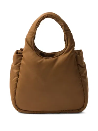 Prada Padded Re-nylon Mini-bag With Bow In Brown