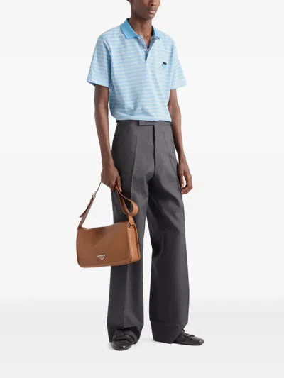 Prada Embroidered Piquet Polo Shirt In Blue