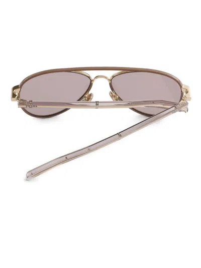 Prada Sunglasses With The Iconic Metal Plaque