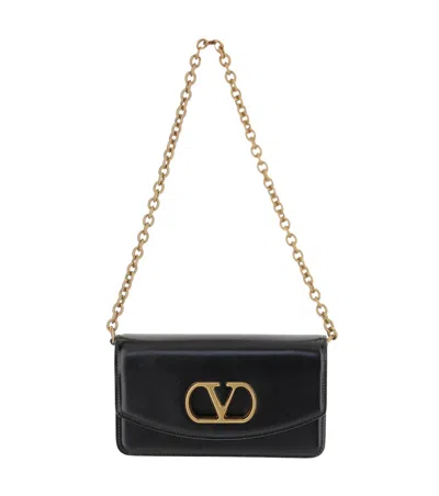 Valentino Garavani Vain Small Vlogo Leather Clutch Bag In Black