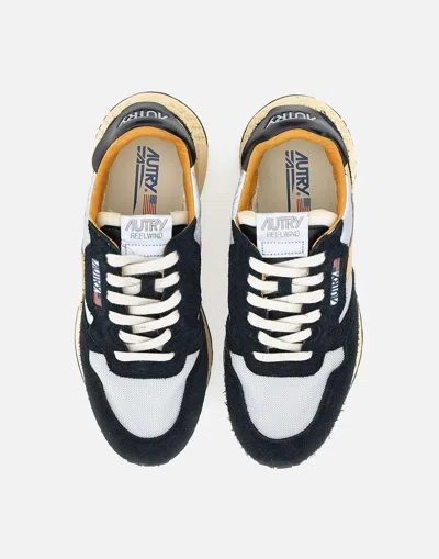 Autry Low Sneaker With Contrast Stitching And Mesh Panels