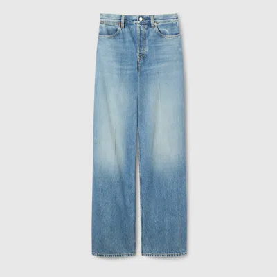 Gucci Blue Jeans With Logo Patch On The Rear And Faded Effect In Denim Woman