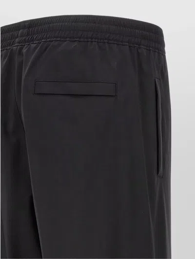 Givenchy Logo Elastic Waistband Pants With Pockets In Black