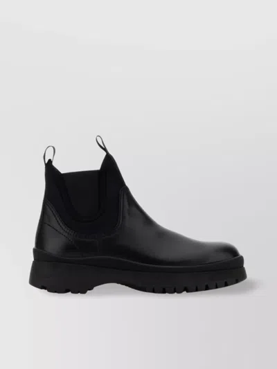 Prada Chunky Sole Leather Ankle Boots In Black