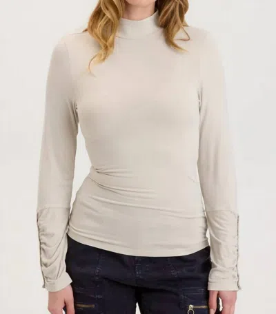 XCVI AINSLEY TURTLENECK TOP IN KLONDIKE PIGMENT 