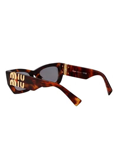 Miu Miu Tortoiseshell-effect Rectangle Sunglasses In Brown