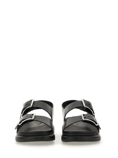 Alexander Mcqueen Black Slide Sandals With Embossed Logo In Leather Man