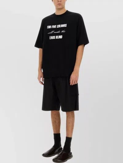 Undercover Graphic Print Black T-shirt With Exposed-seam Detailing And Logo Patch