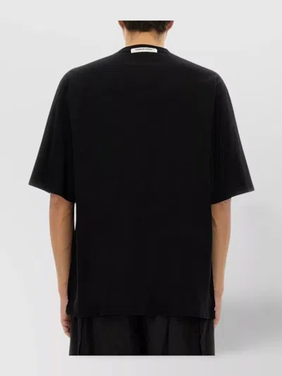 Undercover Graphic Print Black T-shirt With Exposed-seam Detailing And Logo Patch