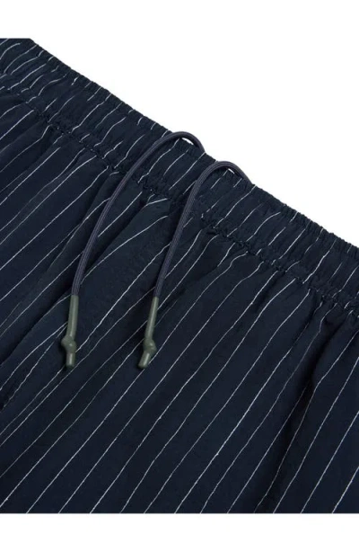 Auto-reply™ Solid 4-inch Nylon Swim Trunks