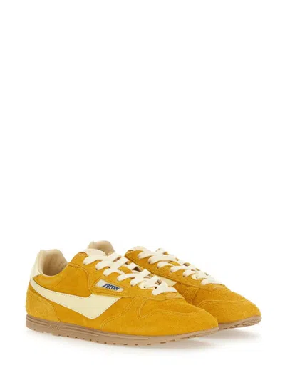 Autry 'windspin Low' Yellow Sneaker With Logo On The Side And On The Heel