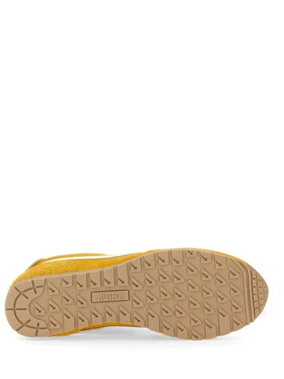 Autry 'windspin Low' Yellow Sneaker With Logo On The Side And On The Heel