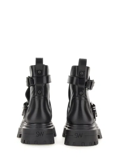 Stuart Weitzman The Maverick Bedford Moto Bootie In Black